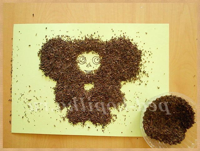 Аплікація з чаю і круп. Чебурашка