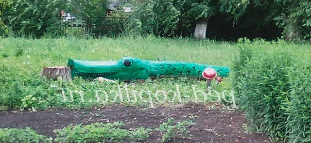 Крокодил з колоди своїми руками