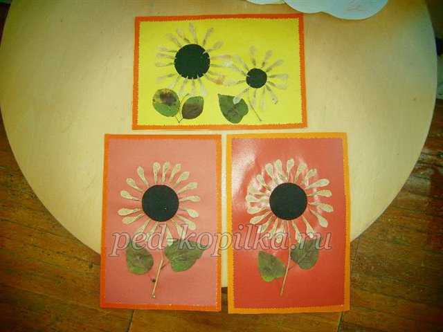 Соняшник. Аплікація з сухого листя Соняшник. Аплікація з сухого листя